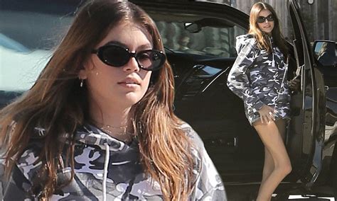 Kaia Gerber Goes Military Chic In Oversized Camouflage Hoodie In Malibu