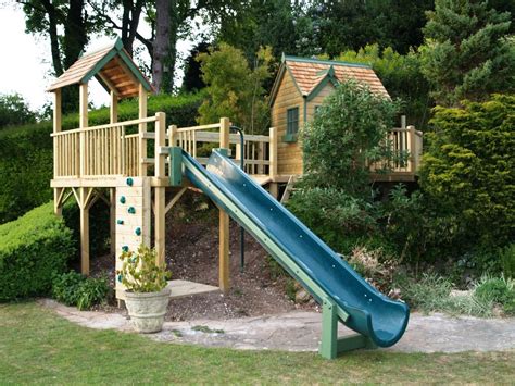 Great Use Of A Slope Sloped Backyard Backyard Playground Sloped