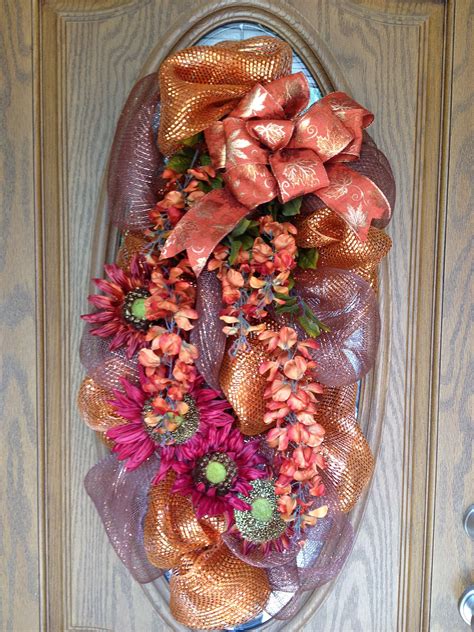 Here is how to make a swag of your own, for a fraction of the cost. Medium sized fall mesh and floral swag. | Floral swag ...