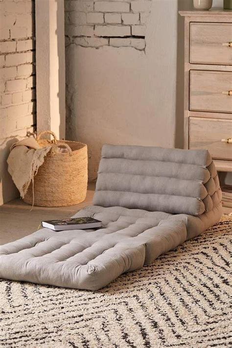 Soft and comfy floor cushion for extra seating in any space, finished with a durable handle for easily transporting. Urban Outfitters Convertible Triangle Floor Cushion # ...