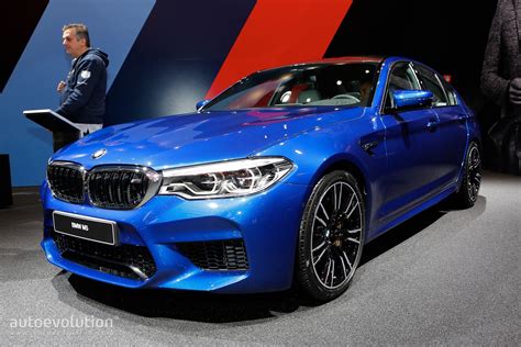 2018 Bmw M5 Flaunts 600 Hp Awd And Frozen Red Paint Autoevolution