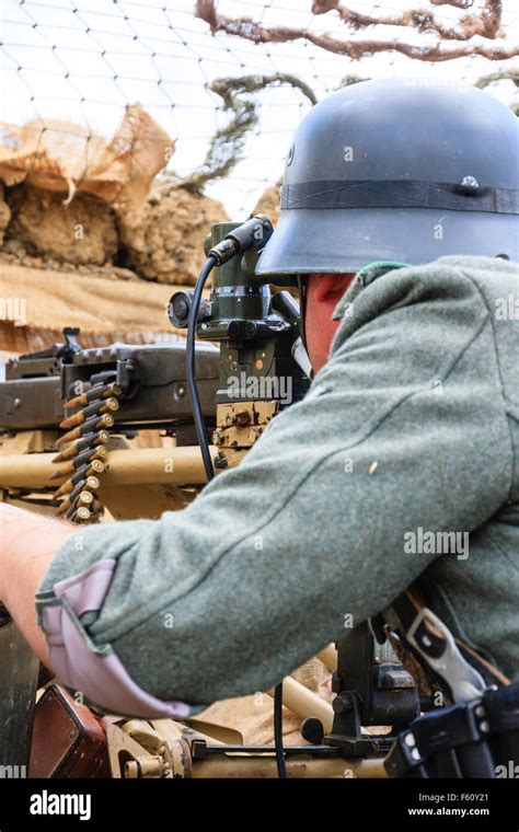 Second World War Re Enactment Close Up Of German Soldier Taking Aim