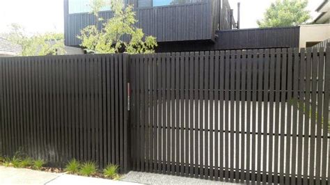 This modern gate was made using horizontal boards of redwood. Top 60 Best Modern Fence Ideas - Contemporary Outdoor Designs