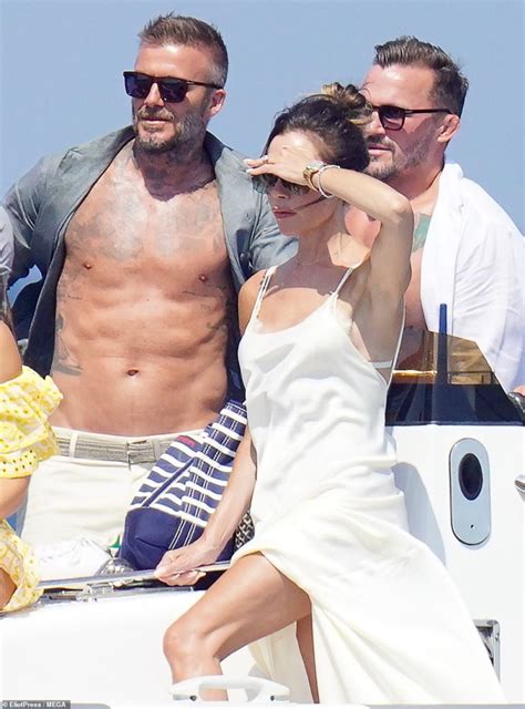 David Beckham Whisks Wife Victoria Off Her Feet And Into His Arms In St Tropez Naija Super Fans