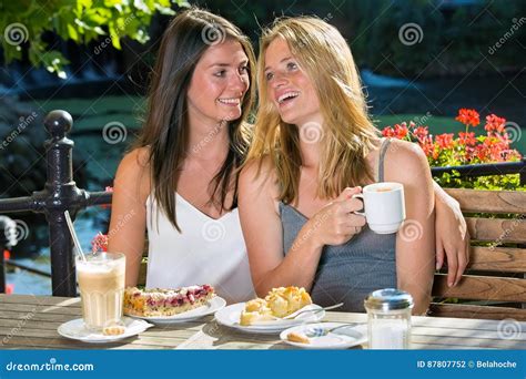 Two Close Female Friends In Outdoor Cafe Stock Photo Image Of