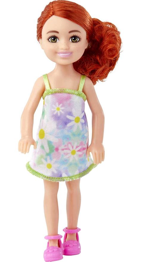 barbie chelsea doll small doll wearing removable floral dress with red