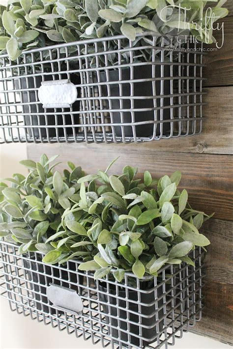 This basket is a great example, it still has the country style decor but feels a little. DIY Farmhouse Style Hanging Wire Baskets On Reclaimed Wood ...