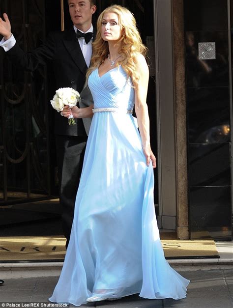 We are all blessed to have this second chance, said ms. Paris Hilton stuns in powder blue bridesmaid dress at ...