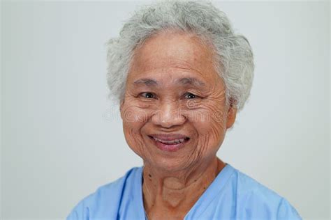 Asian Elder Senior Woman Patient Sitting And Smile Face With Happy On Bed In Hospital Stock