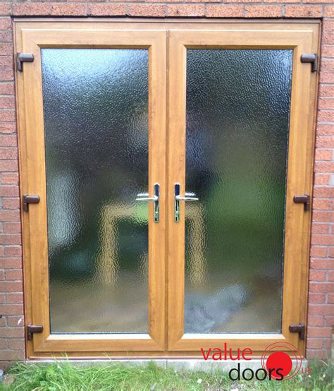 Shop our range of external french doors online at great prices + 10 year guarantee. A uPVC French Door in Oak! | Upvc french doors, French ...