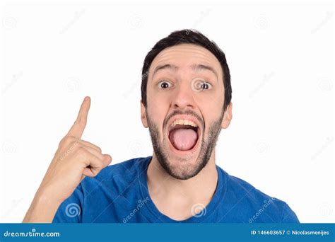 Young Man Shocked Pointing Up Stock Image Image Of Background