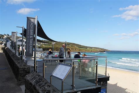 It is situated on the western end of st. Porthmeor Beach Café | St Ives Cornwall