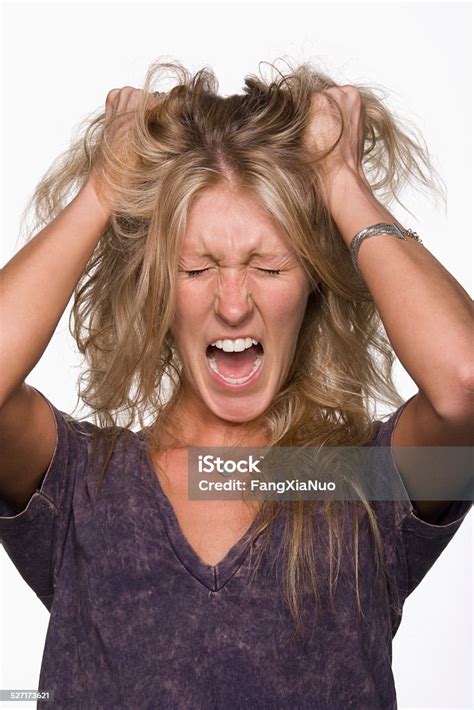 Woman Pulling Her Hair And Screaming Stock Photo Download Image Now