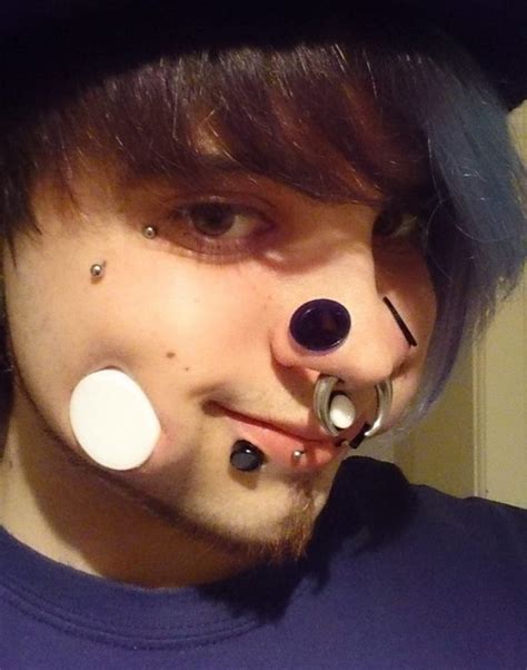 Body Piercing Artist Joel Miggler Drills Holes In Cheeks Like Youve