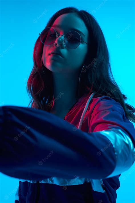 Premium Photo Cool Teenage Girl In Studio With Neon Lights