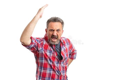 Angry Man Making Shush Quiet Gesture Using Index Finger Stock Photo