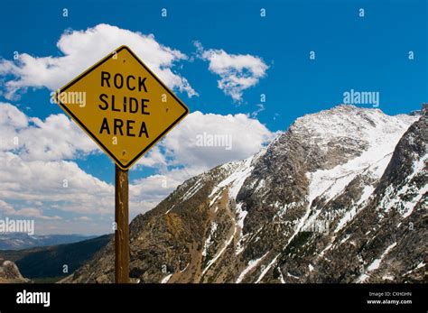 Rock Slide Area Sign In The Mountains Stock Photo Alamy