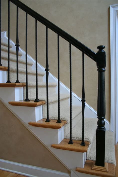 Painted Black Handrail And Newel Posts With Hammered Straights And