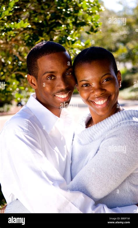 Black African American Couple Happy Together In Sunshine At Home
