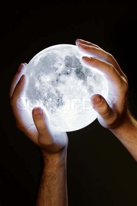 Man Holding The Moon In His Hands Moon Stock Image Colourbox