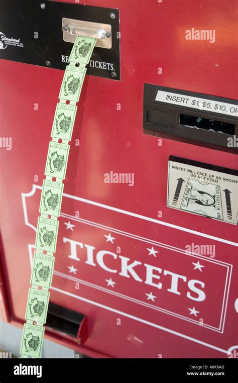 Ticket Vending Machine Dispensing Tickets In Exchange For Paper