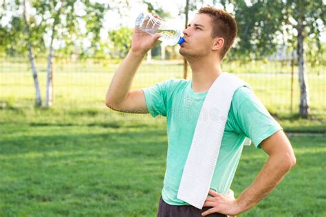 Handsome Man Drinking Water From Plastic Bottle Stock Image Image Of