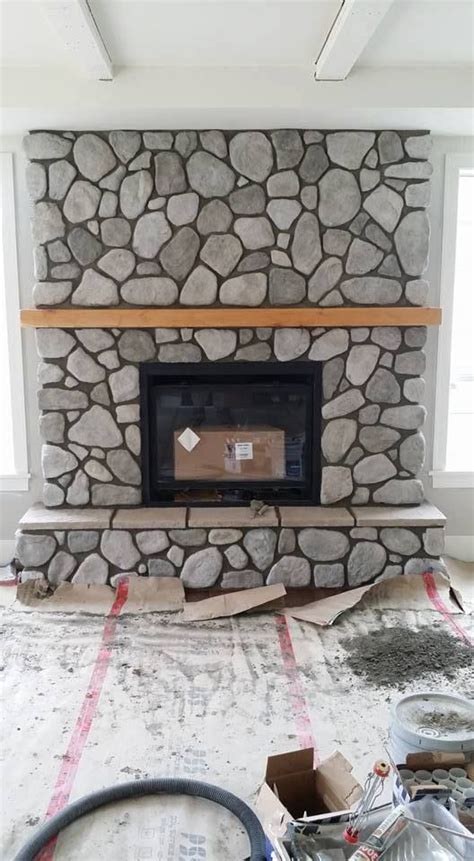 We don't have any plans to move. River Rock Fireplace using Cultured Stone. Another Masonry ...