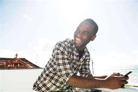 Side Portrait Happy African American Man Using Mobile Phone Outside