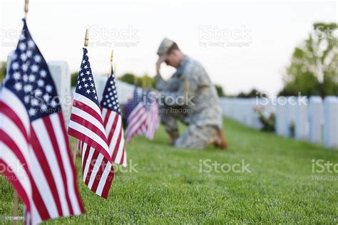 Soldier Kneeling At Grave Stock Photo Download Image Now Us