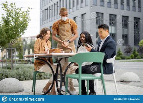 Waiter Taking Order From Client At Outdoor Cafe Stock Image Image Of Business Businesswomen