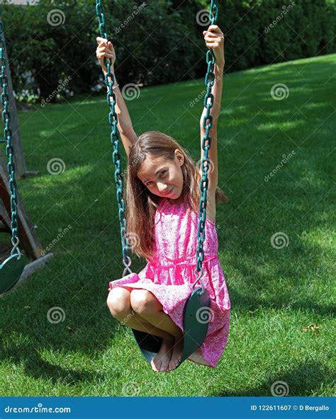 Girl On The Swings Royalty Free Stock Photography