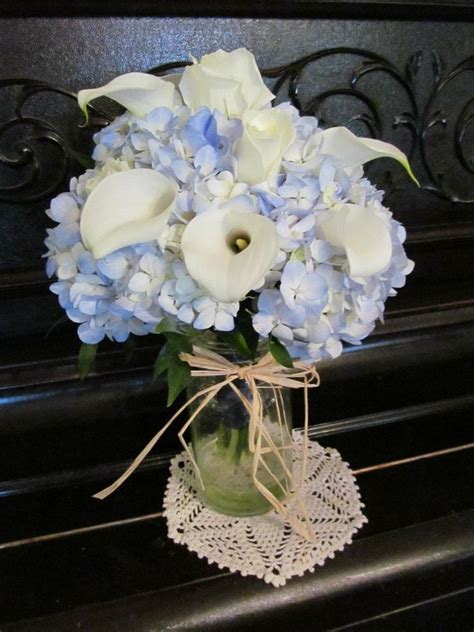 tps_headerhydrangeas are a popular wedding day bloom, and we can totally see why. Wedding bouquet of blue hydrangea, white calla lilies, and ...