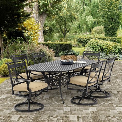 The antique bronze finish is neutral to match any outdoor furniture. Carrolton 7 Piece Cast Aluminum Patio Dining Set With ...