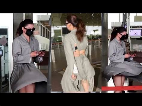 Oops Urvashi Rautelas Naughty Skirt Takes A Flight At Airport Youtube