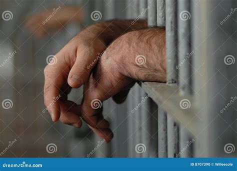 Hands Of Man Behind Jail Bars Royalty Free Stock Image Cartoondealer