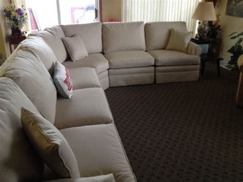 how much does it cost to reupholster a sectional sofa