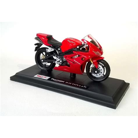 For example, some of them are 2010 and others. Maisto Special Edition Motorbike 1:18 Triumph Daytona 675 Red