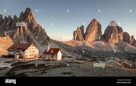 Panorama Of Dreizinnen Hut And Tre Cime At Sunset Dolomites Stock