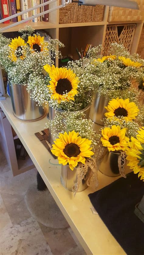 A wedding centerpiece of a stained wooden box and bright succulents of various colors is a cool rustic decor idea. 25+ cute Rustic sunflower centerpieces ideas on Pinterest ...