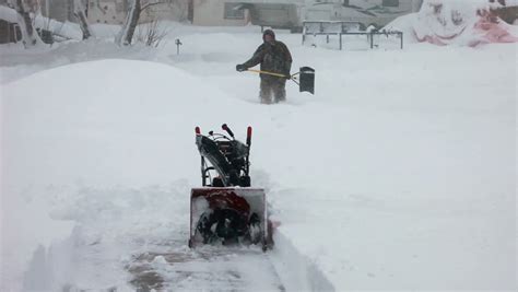 Man Walks Towards Snow Blower In Deep Snow Deep Snow Blizzard Snow