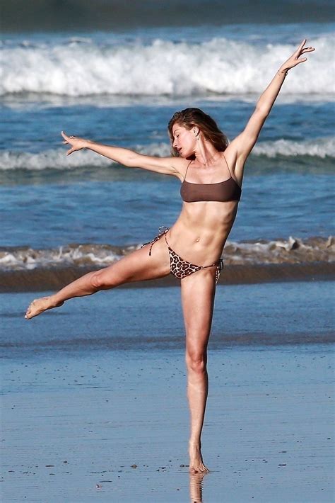 Gisele Bundchen Has Fun On The Beach In A Revealing Bikini Photos