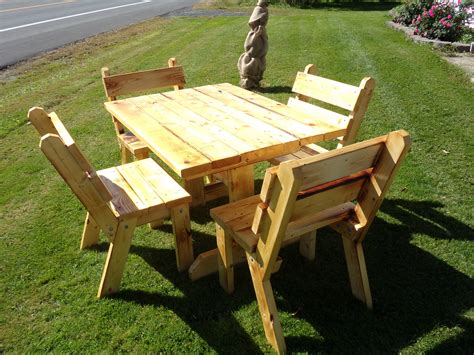 This project cost me around $230 to make with treated lumber and don't forget to mention the cost of the materials, the total time of the project as well as a few impressions about the build. 4 ft table with benches - Bear Den Carvings
