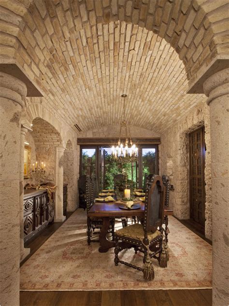 This homeowner wanted to know how to make the fireplace more of a focal point and arrange the furniture to help divide up the space in this tuscan great room. Key Interiors by Shinay: Tuscan Dining Room Design Ideas