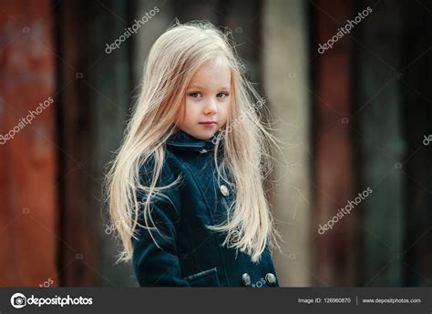 Cute Little Blonde Girl Portrait Stock Photo By ©volkovicha 126960870