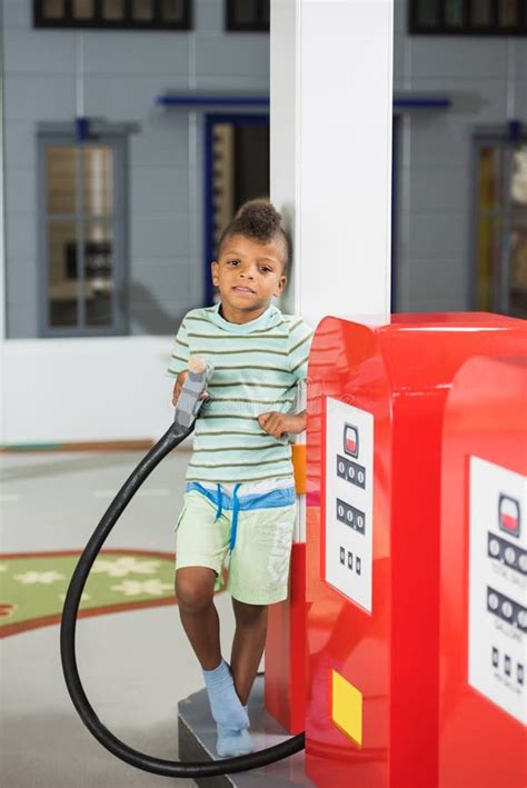 Child Boy At Gas Station Of Game Center Stock Image Image Of