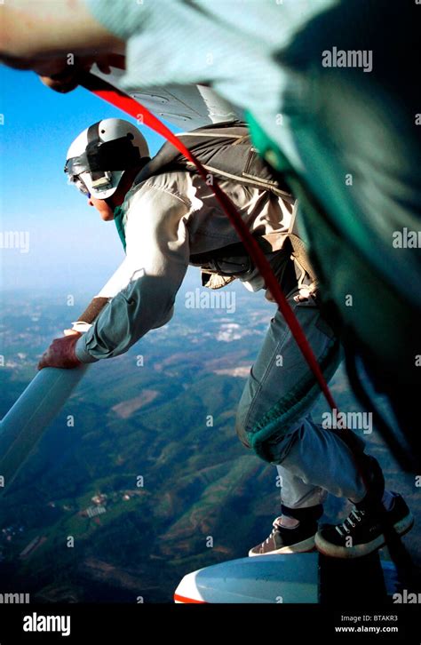 A Parachutist Jumping Of A Plane Stock Photo Alamy