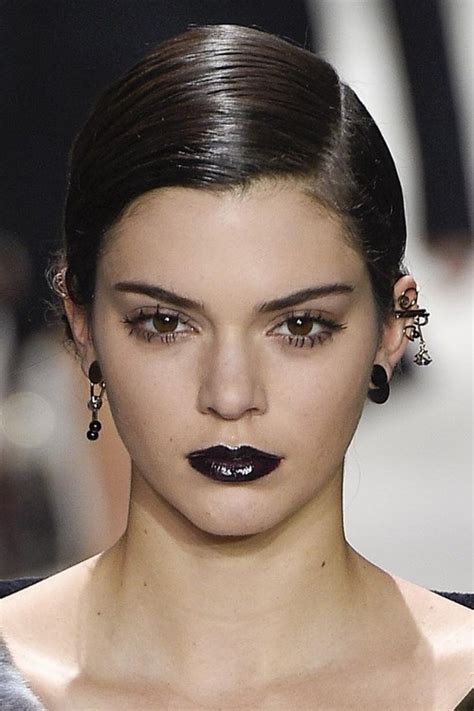 Kendall Jenner Straight Dark Brown Bun Hairstyle Steal Her Style