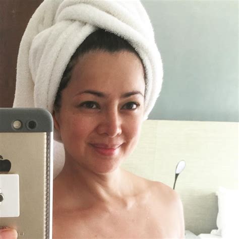 alice dixson sizzles in a white bikini on the beach during her 47th birthday