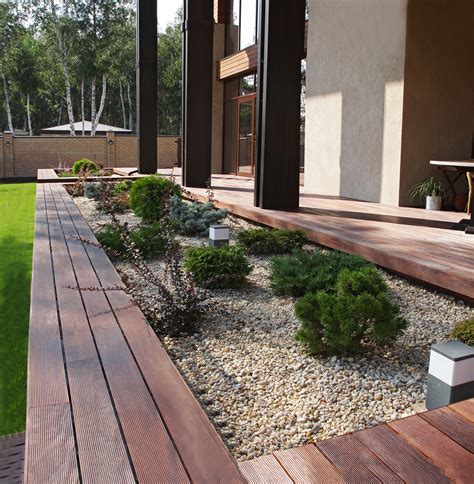 A deck is the perfect place to survey your backyard and. 16 Stunning Scandinavian Landscape Designs For Your ...