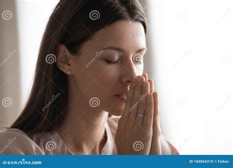 Religious Young Woman Hold Hands Praying At Home Stock Image Image Of